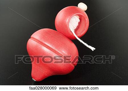 Toy top, close-up View Large Photo Image Stock Photo - Toy top, close-up. Fotosearch