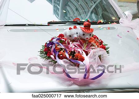 Wedding decorations on hood of car View Large Photo Image Stock Photo - Wedding decorations on hood of car. Fotosearch
