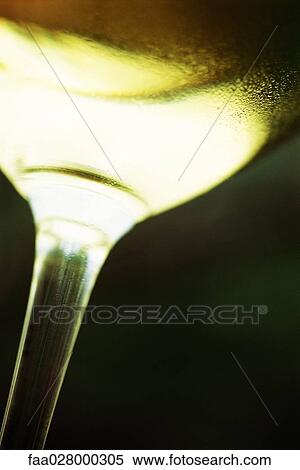 White wine glass, extreme close-up, low angle view View Large Photo Image Stock Photography - White wine glass, extreme close-up, low angle view. Fotosearch