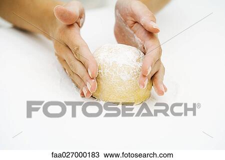 Woman kneading dough, cropped view of hands View Large Photo Image Stock Image - Woman kneading dough, cropped view of hands. Fotosearch