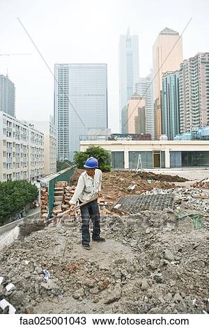 Worker in construction site View Large Photo Image Stock Image - Worker in construction site. Fotosearch