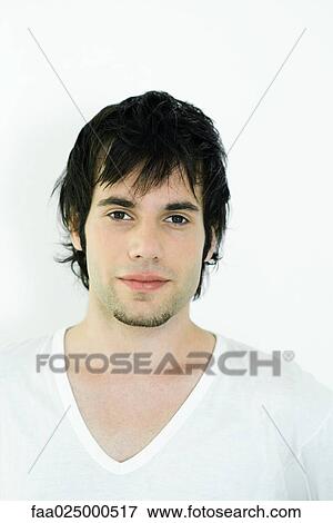 Young man with goatee smiling at camera, portrait View Large Photo Image Stock Photo - Young man with goatee smiling at camera, portrait. Fotosearch
