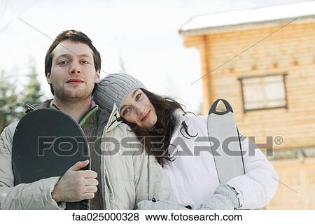 Young skier and snowboarder, smiling, portrait View Large Photo Image Stock Photo - Young skier and snowboarder, smiling, portrait. Fotosearch