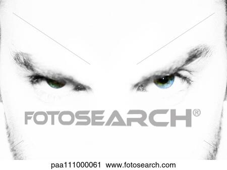 Stock Image - Man knitting brows, close-up. Fotosearch