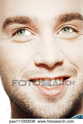 Stock Photograph - Man smiling, close-up, portrait. Fotosearch