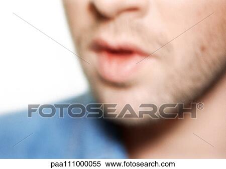 Stock Photography - Man's lower face, close-up, blurred. Fotosearch