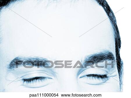 Man's upper face, eyes closed, close-up View Large Photo Image Picture - Man's upper face, eyes closed, close-up. Fotosearch