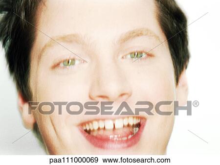 Teenage boy smiling, close-up View Large Photo Image Stock Photo - Teenage boy smiling, close-up. Fotosearch