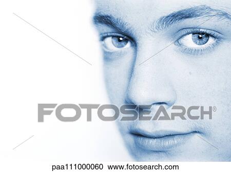 Stock Image - Teenager's face, close-up. Fotosearch