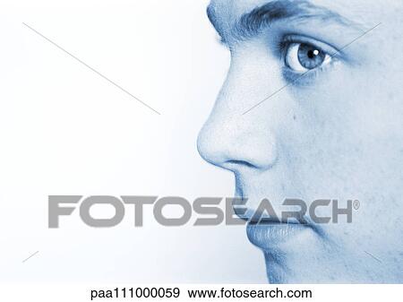 Stock Photo - Teenager's face, side view, close-up. Fotosearch