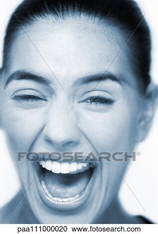 Woman laughing, close-up, portrait View Large Photo Image Stock Image - Woman laughing, close-up, portrait. Fotosearch