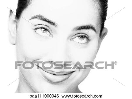 Woman smiling, looking up, close-up, portrait, b&w View Large Photo Image Stock Photograph - Woman smiling, looking up, close-up, portrait, b&w. Fotosearch