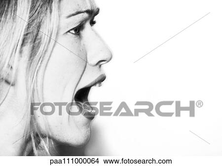 Picture - Woman's face, open-mouthed, side view, b&w. Fotosearch