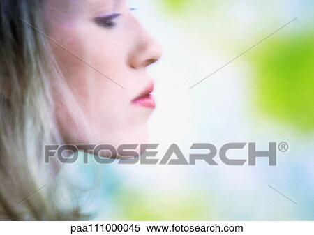 Stock Photography - Woman's face, side view, close-up. Fotosearch
