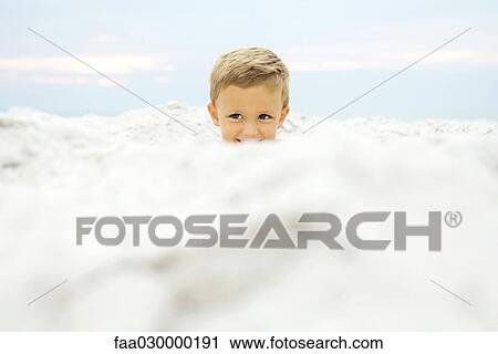 Boy's head emerging from sand View Large Photo Image Stock Image - Boy's head emerging from sand. Fotosearch