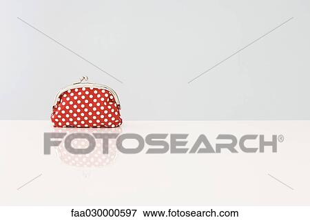 Stock Photo - Change purse with polka dots. Fotosearch