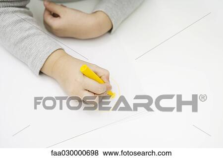 Child coloring with crayon, cropped view of hand View Large Photo Image Stock Photo - Child coloring with crayon, cropped view of hand. Fotosearch