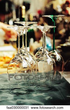 Stock Image - Freshly cleaned wine glasses. Fotosearch