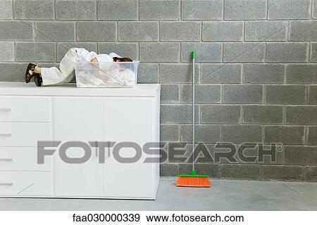 Little boy hiding in laundry basket View Large Photo Image Stock Photo - Little boy hiding in laundry basket. Fotosearch