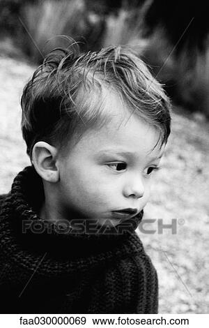 Stock Photo - Little boy, portrait, black and white. Fotosearch