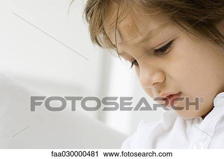 Little boy with adhesive bandage on forehead, looking down, cropped View Large Photo Image Stock Image - Little boy with adhesive bandage on forehead, looking down, cropped. Fotosearch