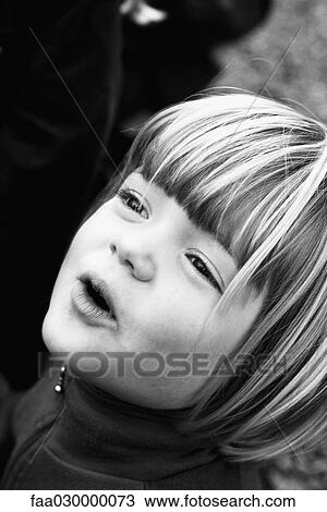 Little girl looking up, portrait, black and white View Large Photo Image Stock Image - Little girl looking up, portrait, black and white. Fotosearch