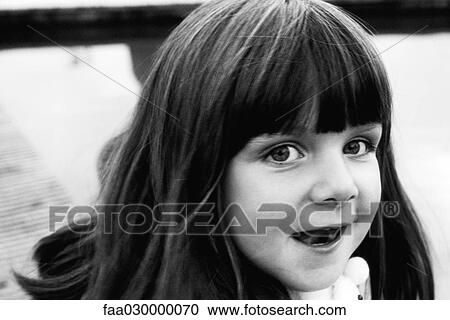 Stock Image - Little girl, portrait, black and white. Fotosearch