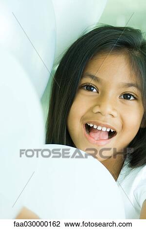 Little girl surrounded by balloons View Large Photo Image Stock Image - Little girl surrounded by balloons. Fotosearch