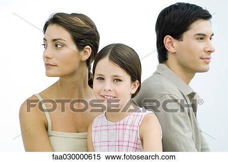 Parents and daughter, portrait, girl smiling at camera View Large Photo Image Stock Photography - Parents and daughter, portrait, girl smiling at camera. Fotosearch