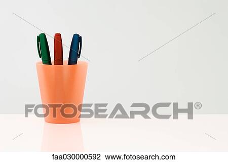 Pens in a cup, close-up View Large Photo Image Stock Image - Pens in a cup, close-up. Fotosearch