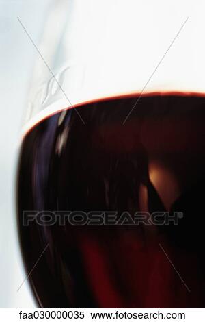 Red wine in wine glass, extreme close-up View Large Photo Image Stock Photography - Red wine in wine glass, extreme close-up. Fotosearch