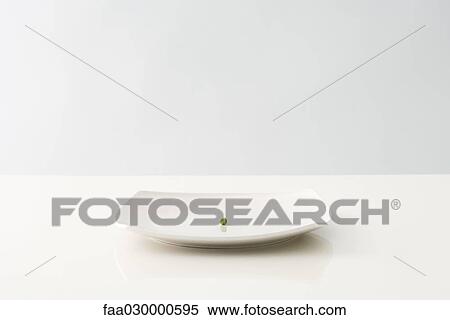 Single pea on plate, close-up View Large Photo Image Stock Photography - Single pea on plate, close-up. Fotosearch