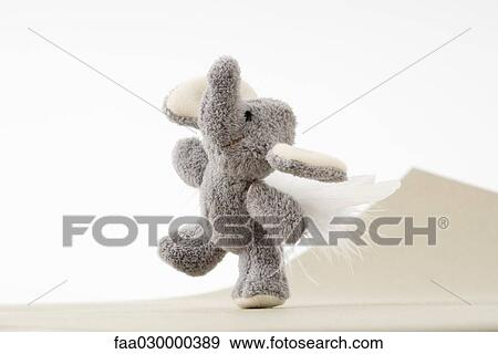 Stock Photo - Stuffed elephant toy with wings. Fotosearch