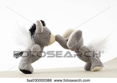 Stuffed toys face to face, touching noses View Large Photo Image Stock Photo - Stuffed toys face to face, touching noses. Fotosearch