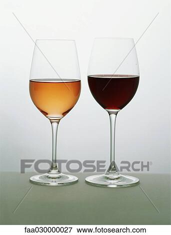 Two glasses of wine side by side, rose and red View Large Photo Image Stock Photo - Two glasses of wine side by side, rose and red. Fotosearch