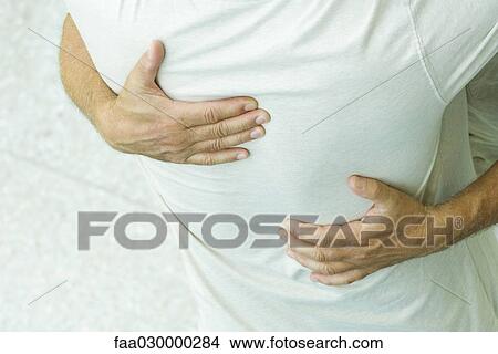 Two men embracing, cropped view View Large Photo Image Picture - Two men embracing, cropped view. Fotosearch