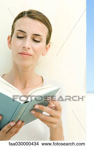 Woman reading book View Large Photo Image Picture - Woman reading book. Fotosearch