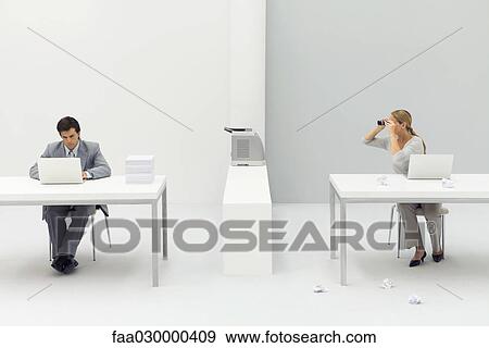 Woman sitting at desk with paper crumpled around her, looking through binoculars at neighboring coworker View Large Photo Image Stock Photo - Woman sitting at desk with paper crumpled around her, looking through binoculars at neighboring coworker. Fotosearch