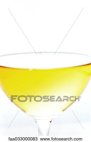 Stock Image - Glass of white wine, close-up. Fotosearch