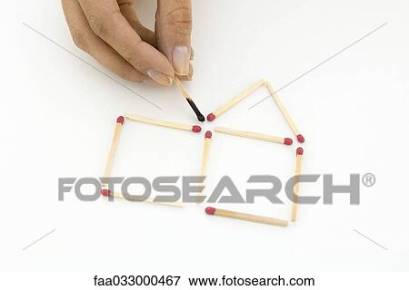 Hand arranging matches, holding one burnt match View Large Photo Image Stock Photo - Hand arranging matches, holding one burnt match. Fotosearch