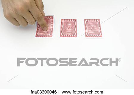 Hand turning over card View Large Photo Image Stock Image - Hand turning over card. Fotosearch