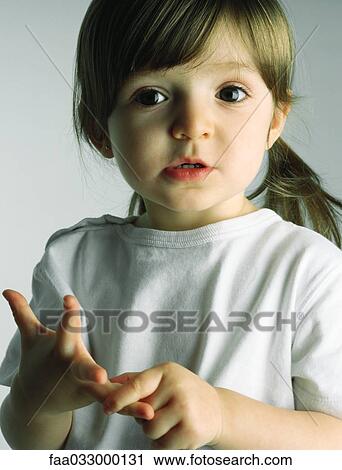 Little girl counting with her fingers, looking at camera, portrait View Large Photo Image Stock Image - Little girl counting with her fingers, looking at camera, portrait. Fotosearch