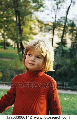 Little girl outdoors, wearing turtleneck, looking away, portrait View Large Photo Image Stock Image - Little girl outdoors, wearing turtleneck, looking away, portrait. Fotosearch