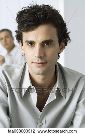 Man looking at camera, portrait View Large Photo Image Stock Image - Man looking at camera, portrait. Fotosearch