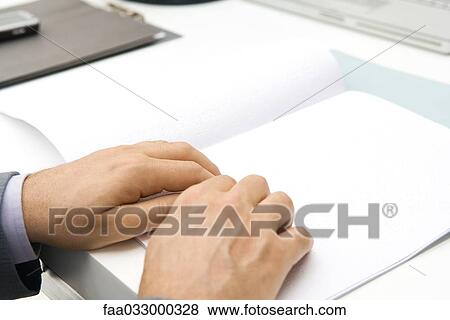Man reading braille, cropped view of hands View Large Photo Image Stock Photo - Man reading braille, cropped view of hands. Fotosearch