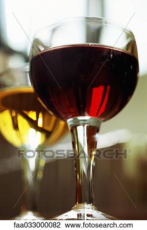 Red wine and white wine in glasses, low angle view View Large Photo Image Stock Image - Red wine and white wine in glasses, low angle view. Fotosearch