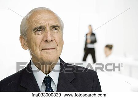 Senior businessman looking up, portrait View Large Photo Image Stock Photo - Senior businessman looking up, portrait. Fotosearch