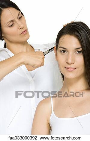 Woman having her hair cut, smiling at camera View Large Photo Image Stock Image - Woman having her hair cut, smiling at camera. Fotosearch