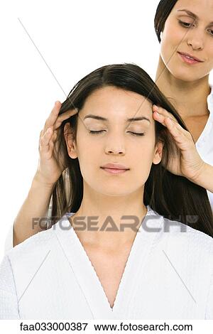 Woman receiving head massage, eyes closed View Large Photo Image Stock Photo - Woman receiving head massage, eyes closed. Fotosearch