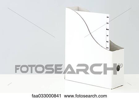 Box holding file folder with tabs with month abbreviations on them View Large Photo Image Stock Image - Box holding file folder with tabs with month abbreviations on them. Fotosearch
